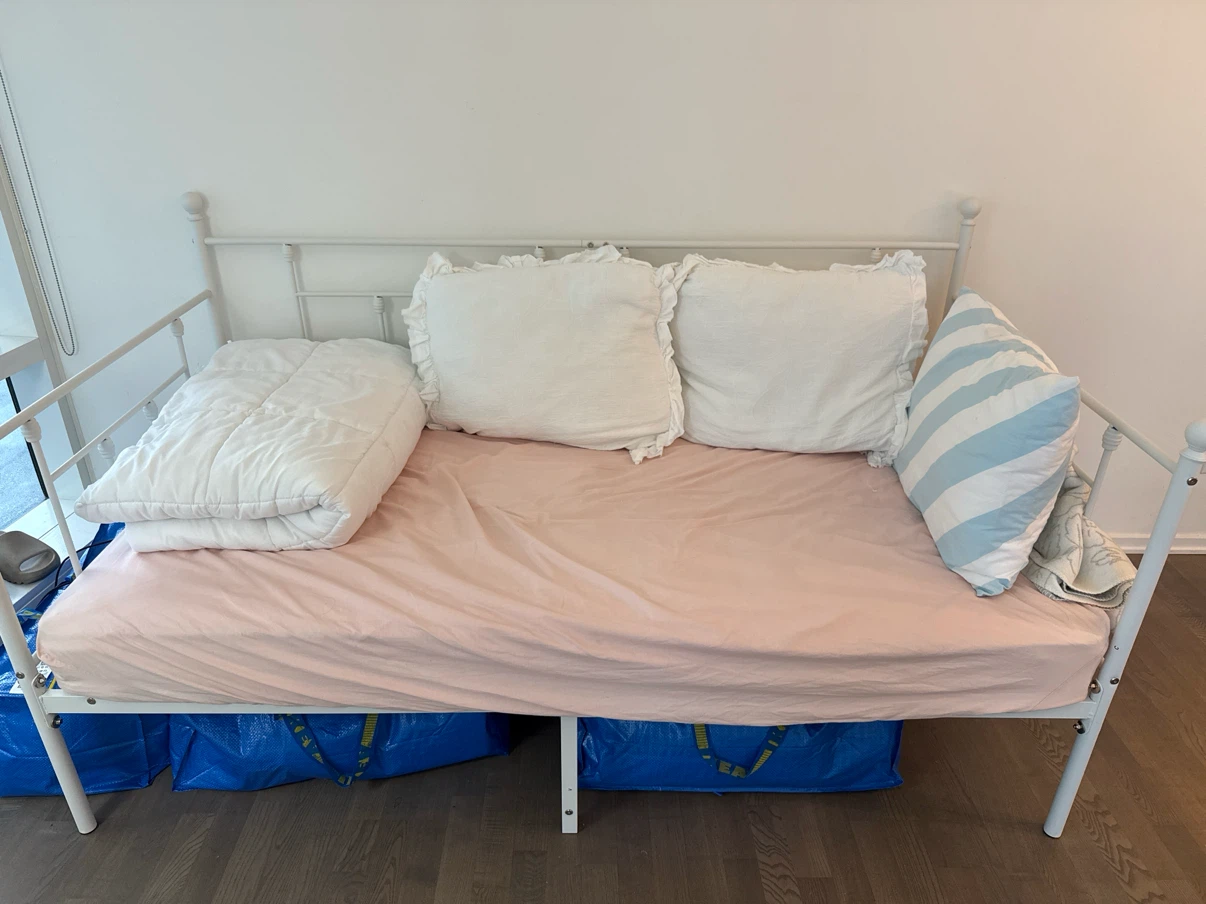 White Metal Daybed Frame and mattress.