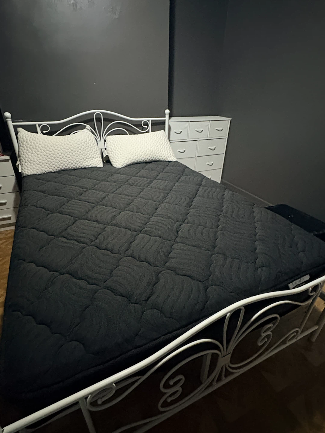 Black Queen size mattress and its White bed