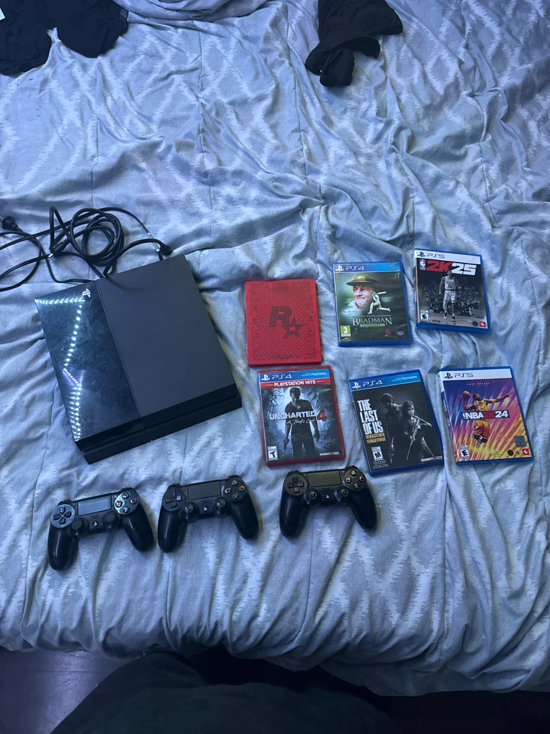 PlayStation 4 Console with 3 Controllers and 5 Games
