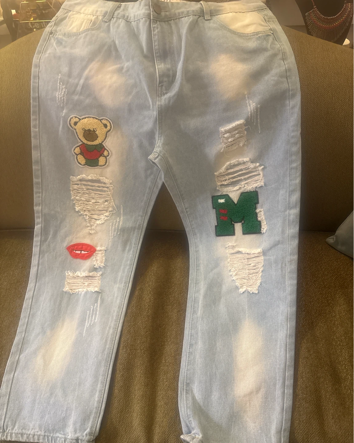 Light Wash Distressed Jeans with Patches