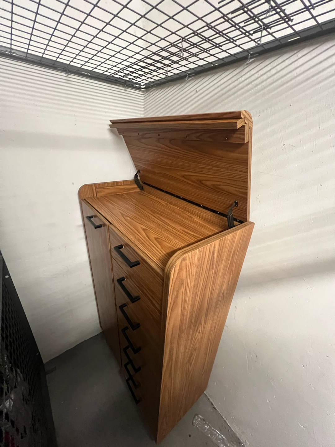 Wooden tall dresser with flip-top lid
