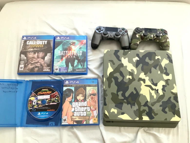 PlayStation 4  PS4 Slim 1TB with 2 Controllers 15 Games
