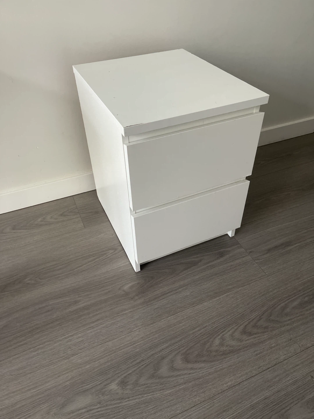 2 White two-drawer nightstand