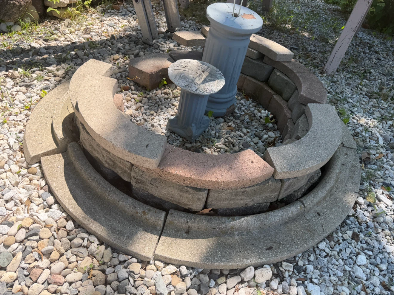 Circular Stone Fire Pit with Pedestal Accents