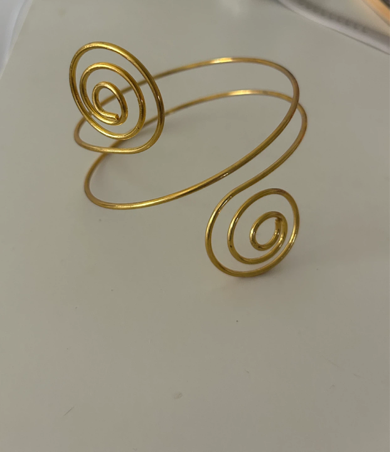 Gold Tone Arm Cuff with Swirl Design