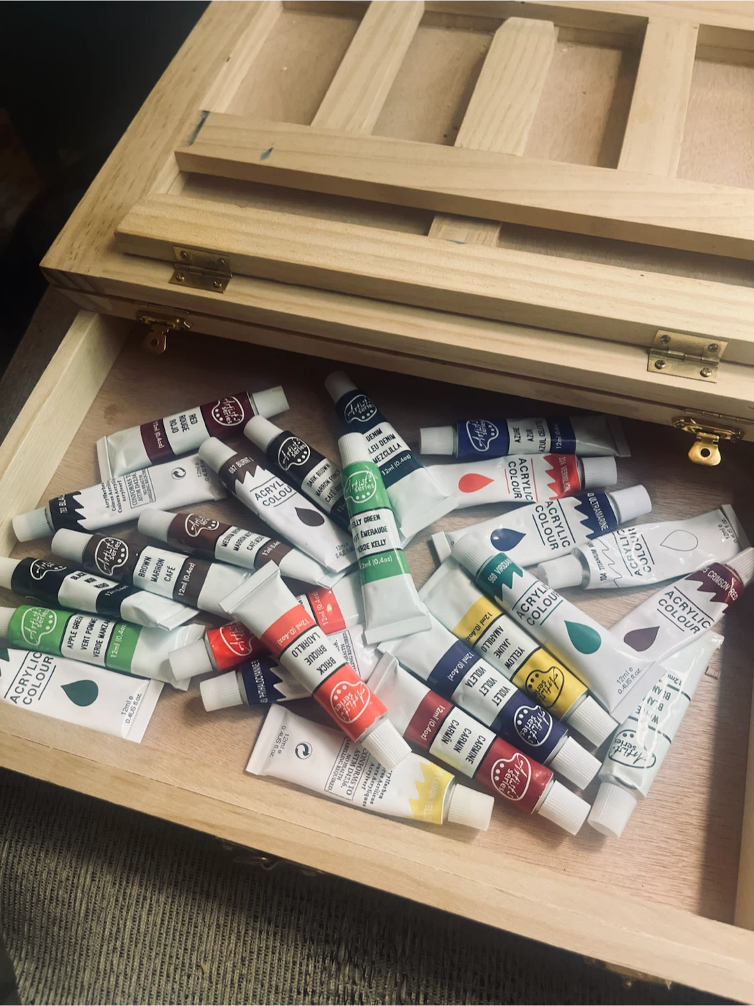 Artist Easel with Acrylic Paints brushes canvases