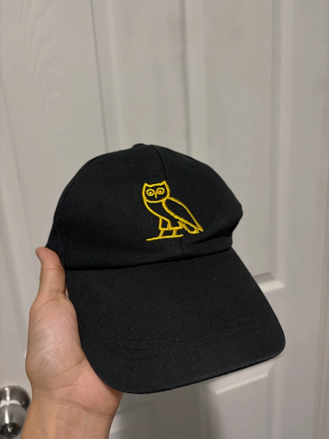 Black cap with Owl design