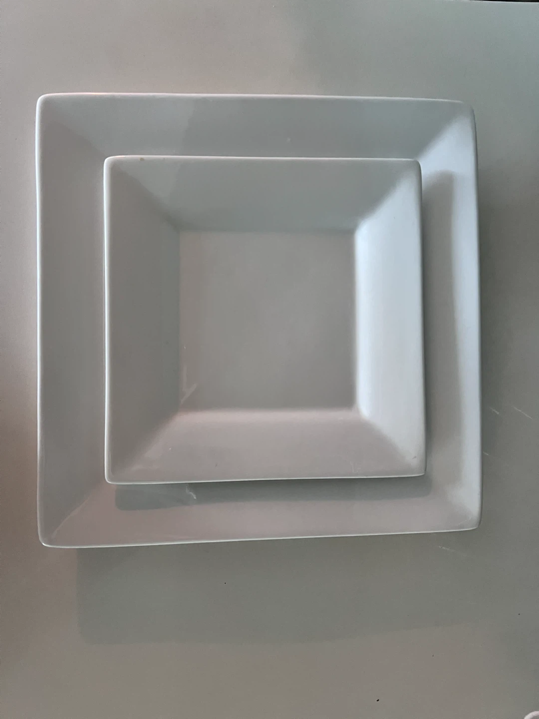 Set of four square dinner plates and salad plates