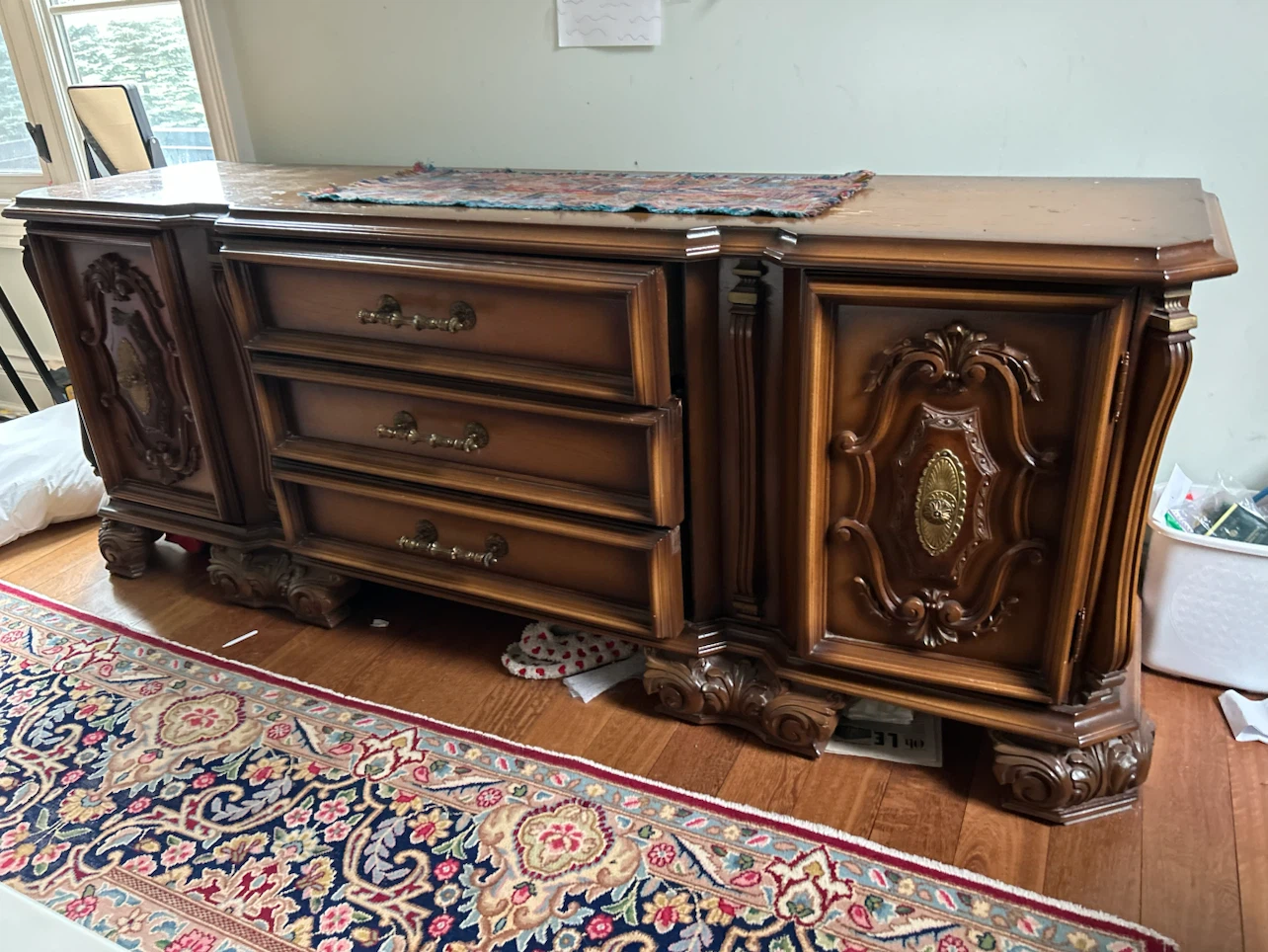 Antique Wooden Dresser with Ornate Details