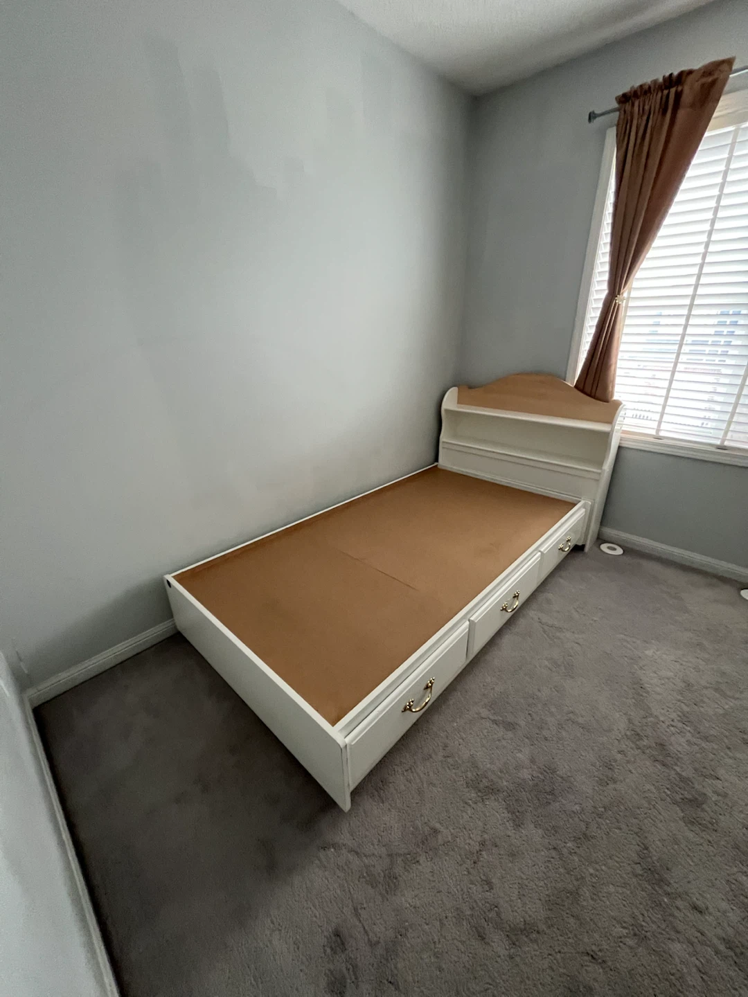 White Twin Bed Frame with Built-in Shelving and Drawers
