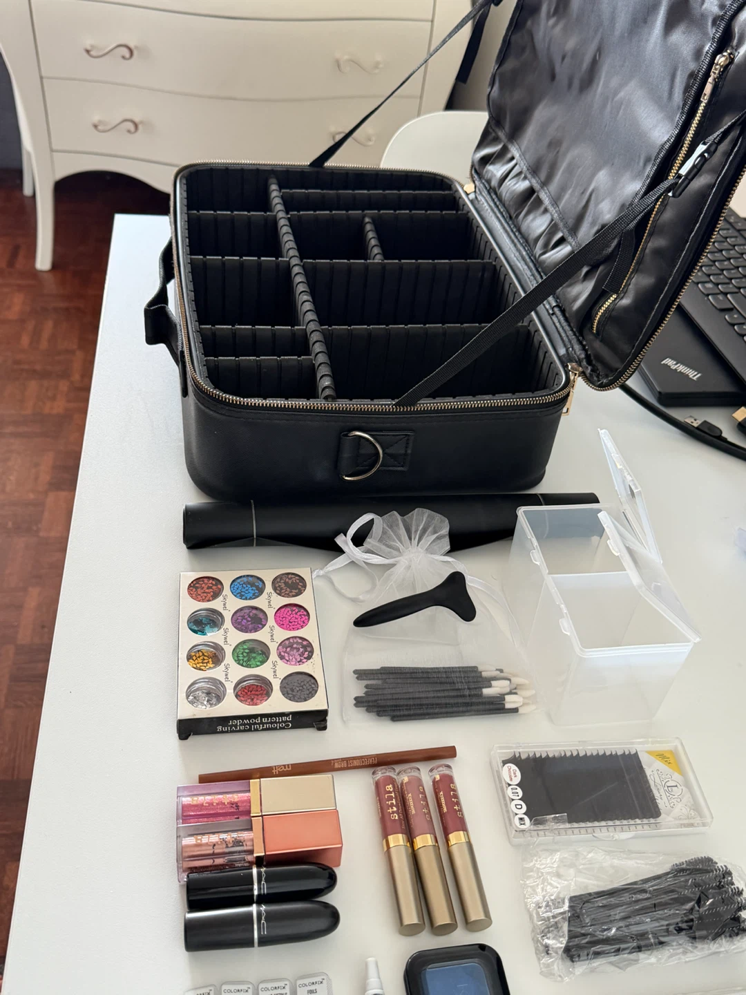 Makeup Train Case with Assorted Makeup Brushes and Products