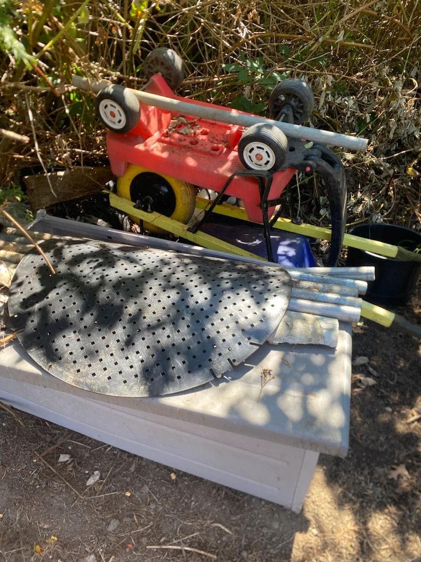 Wheel Barrow and garlic ground cover sheeting - photo 4