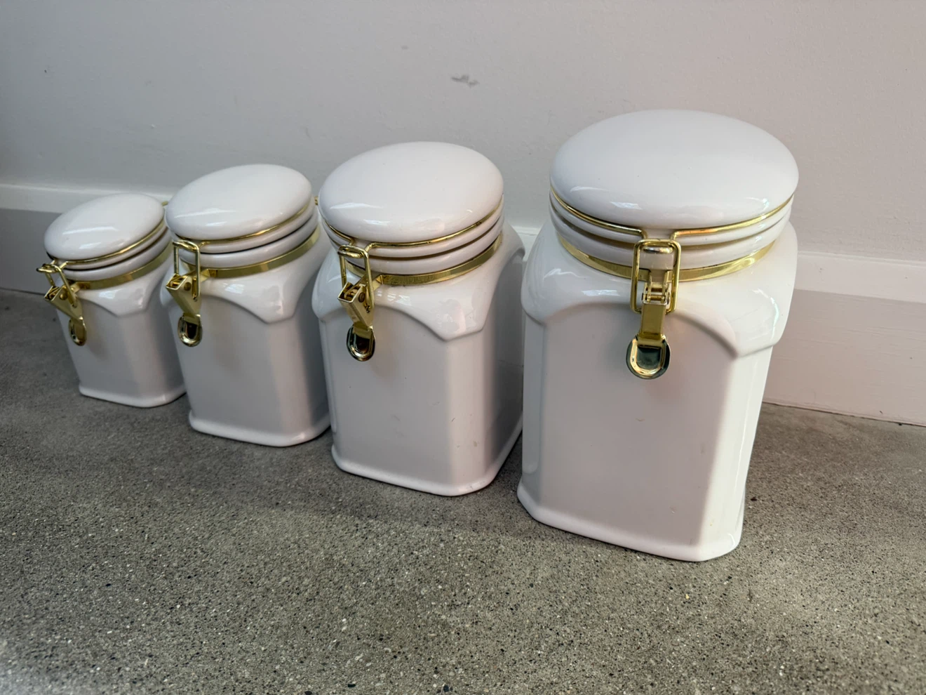 Set of 4 White Ceramic Canisters with Gold Accents - photo 2