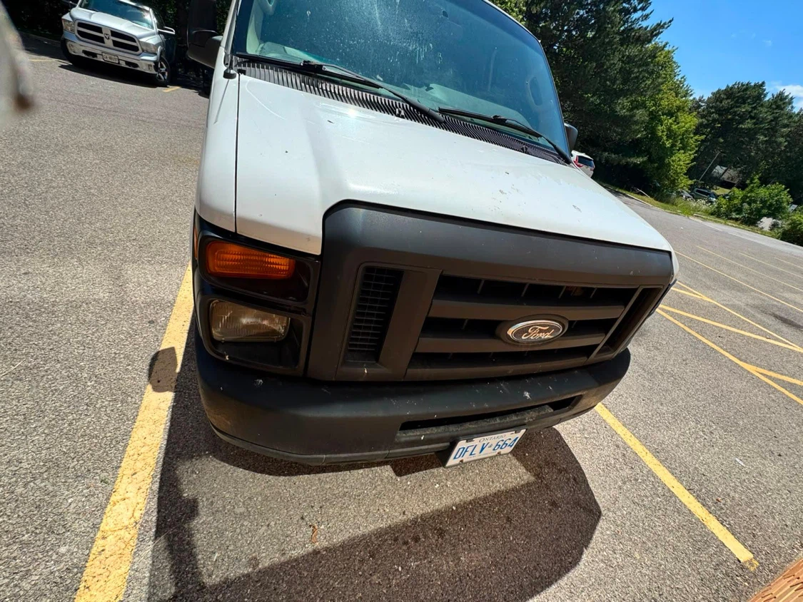 White Ford E-Series Van