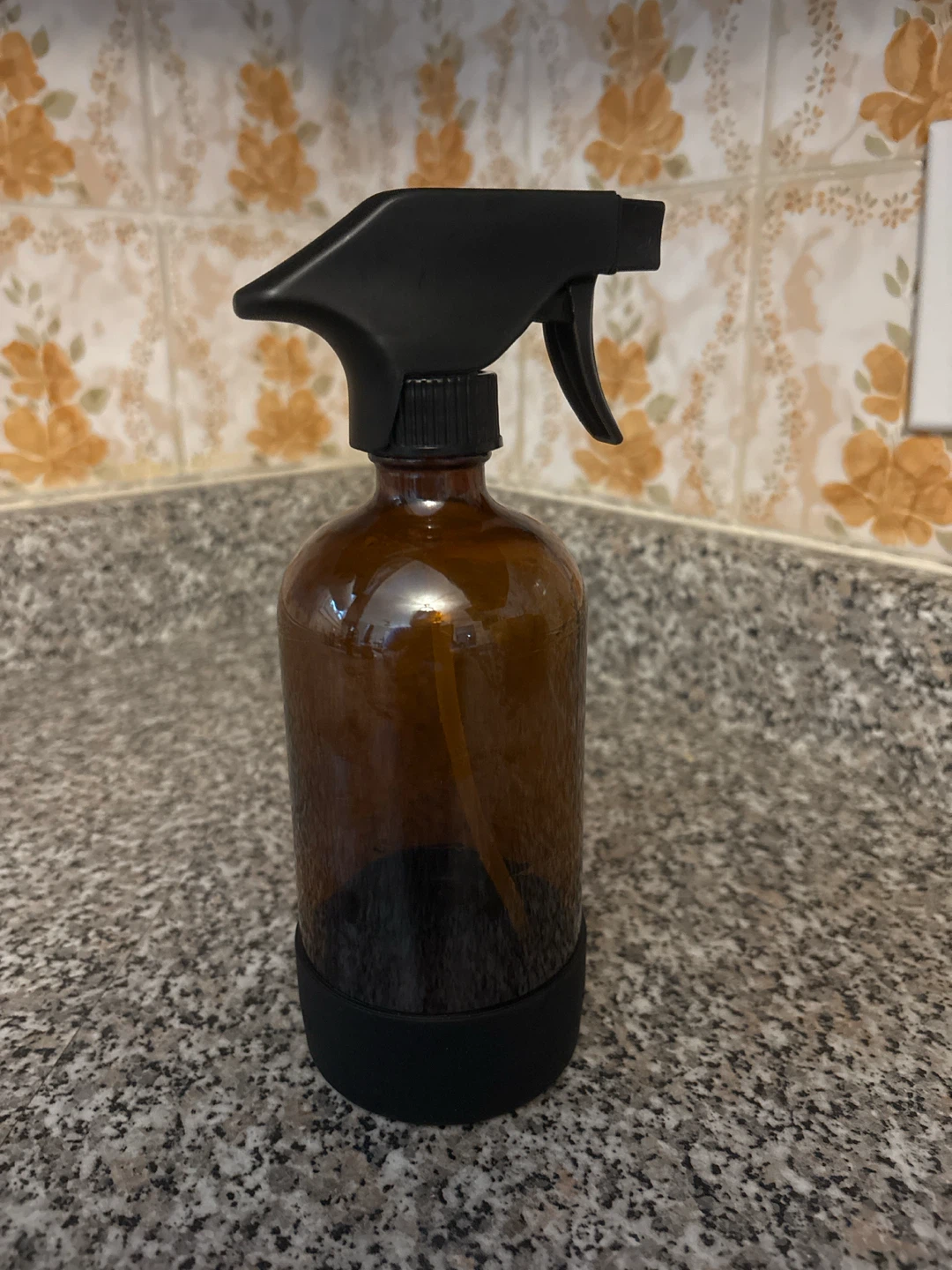 Amber Glass Spray Bottle with Black Silicone Base