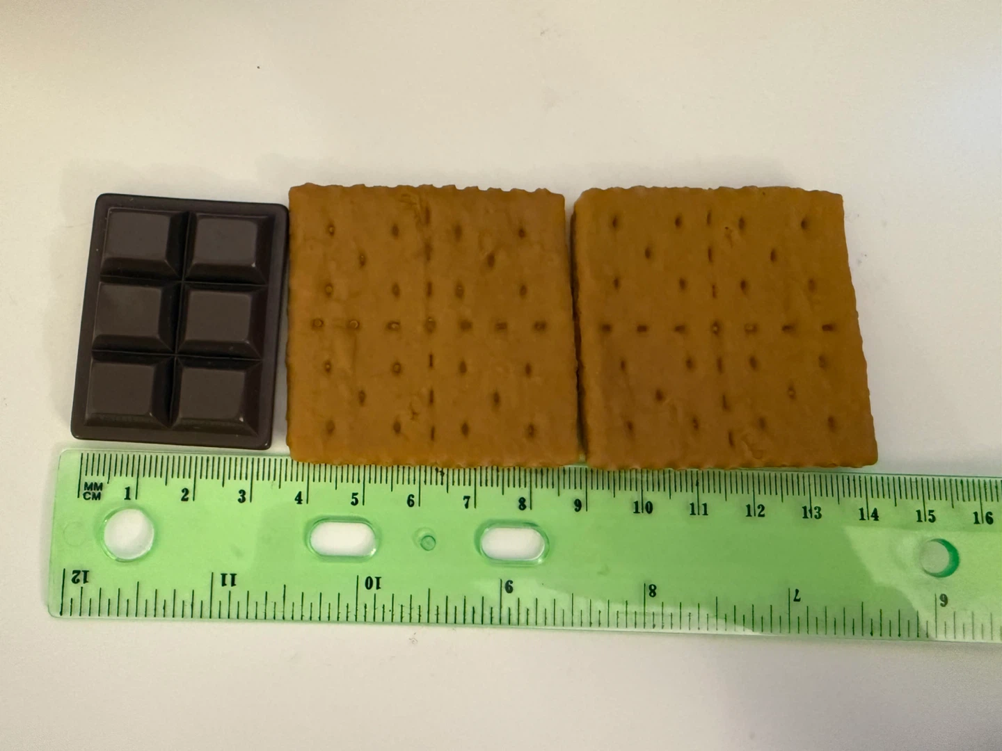 Chocolate and biscuit charms