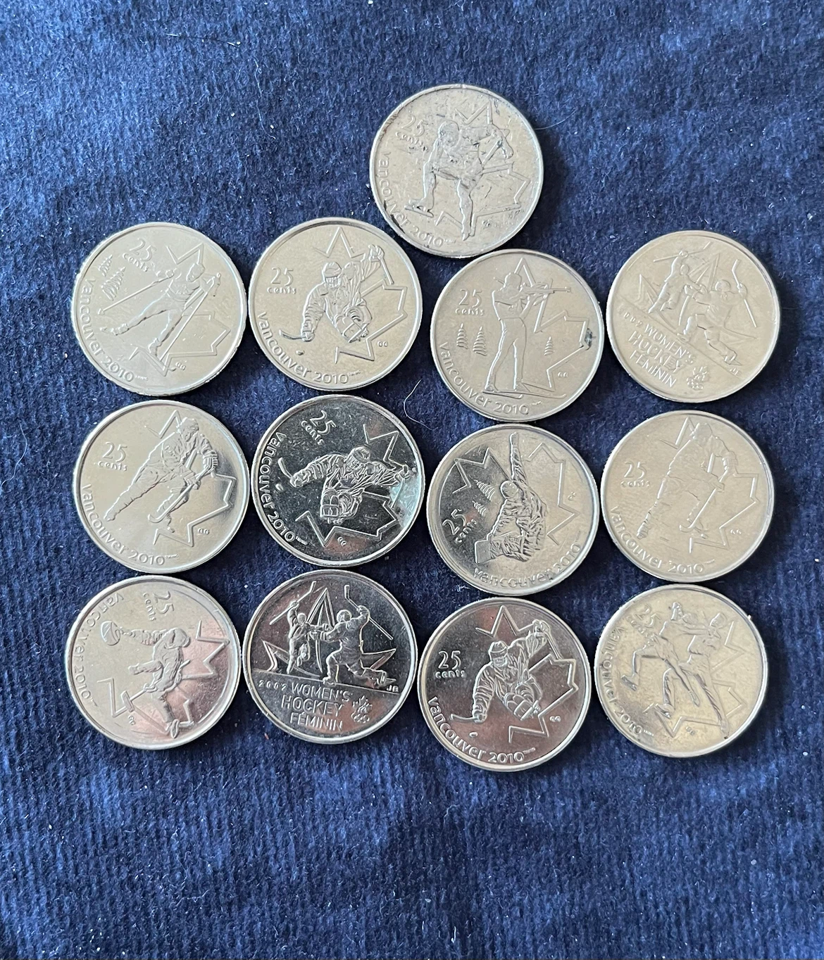 Collection of 14 Canadian 25-cent coins