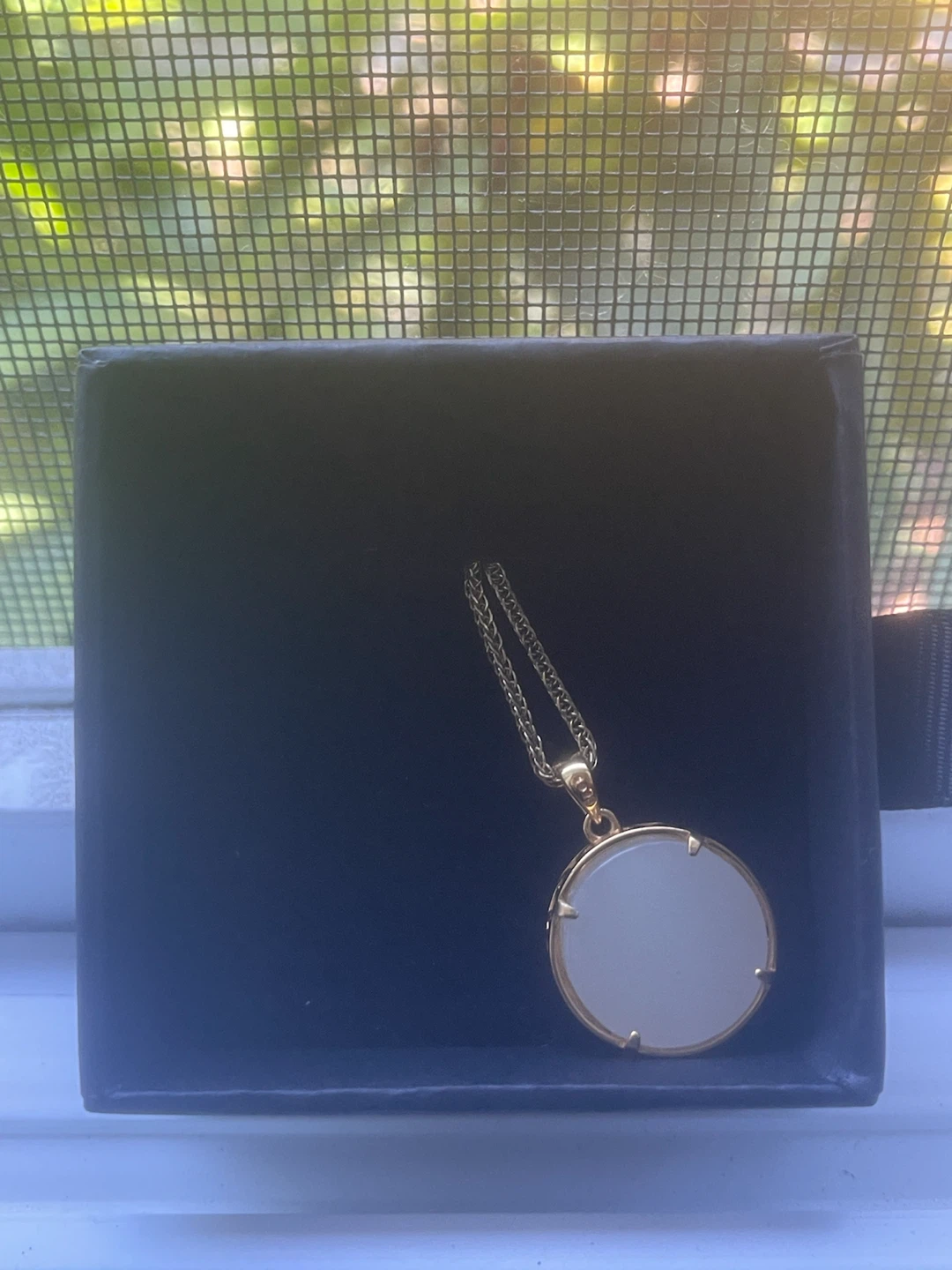 Gold tone pendant necklace with white stone - photo 2