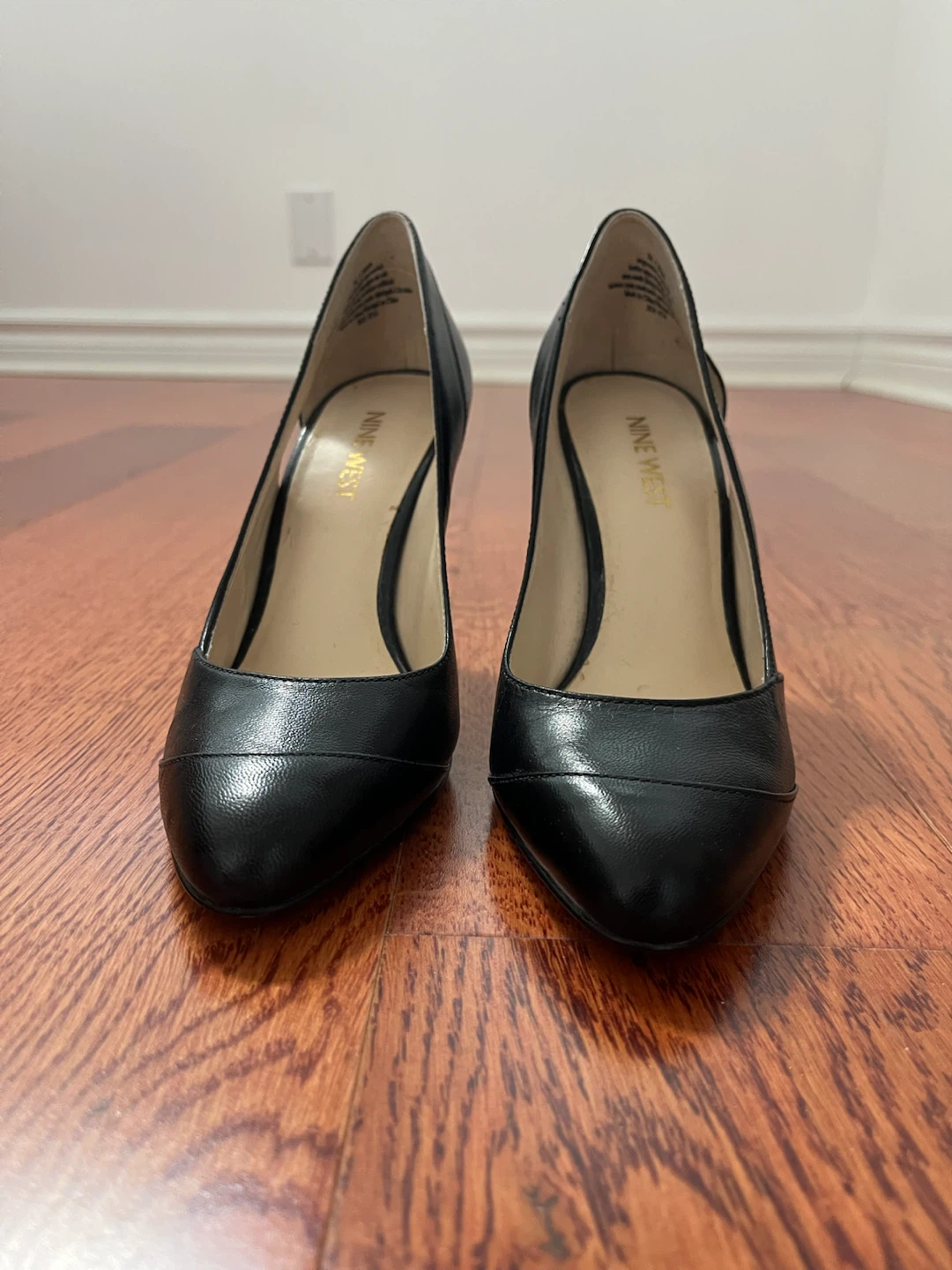 Nine West leather pumps.