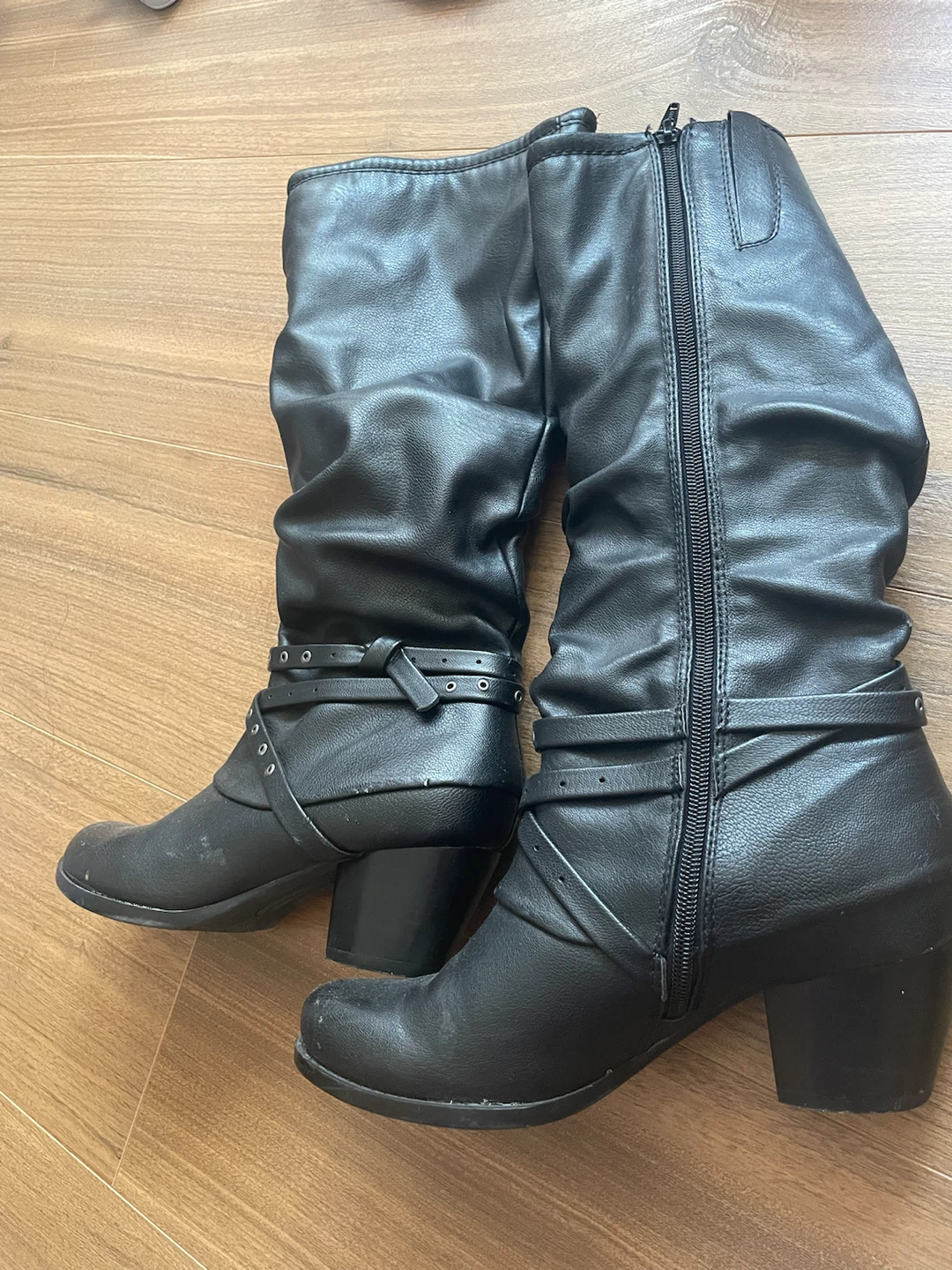 Black slouch boots with buckle detail