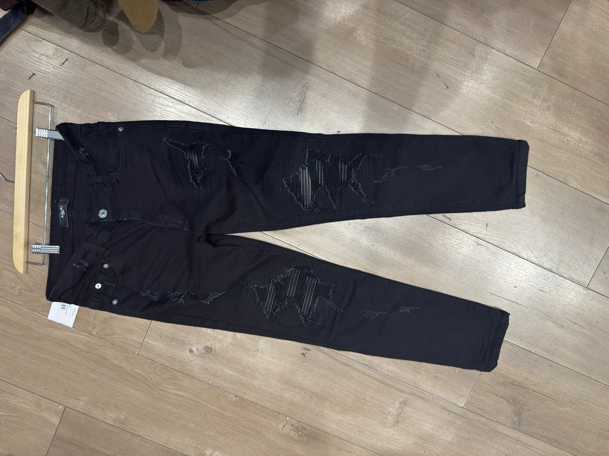 AMIRI Black Distressed Skinny Jeans