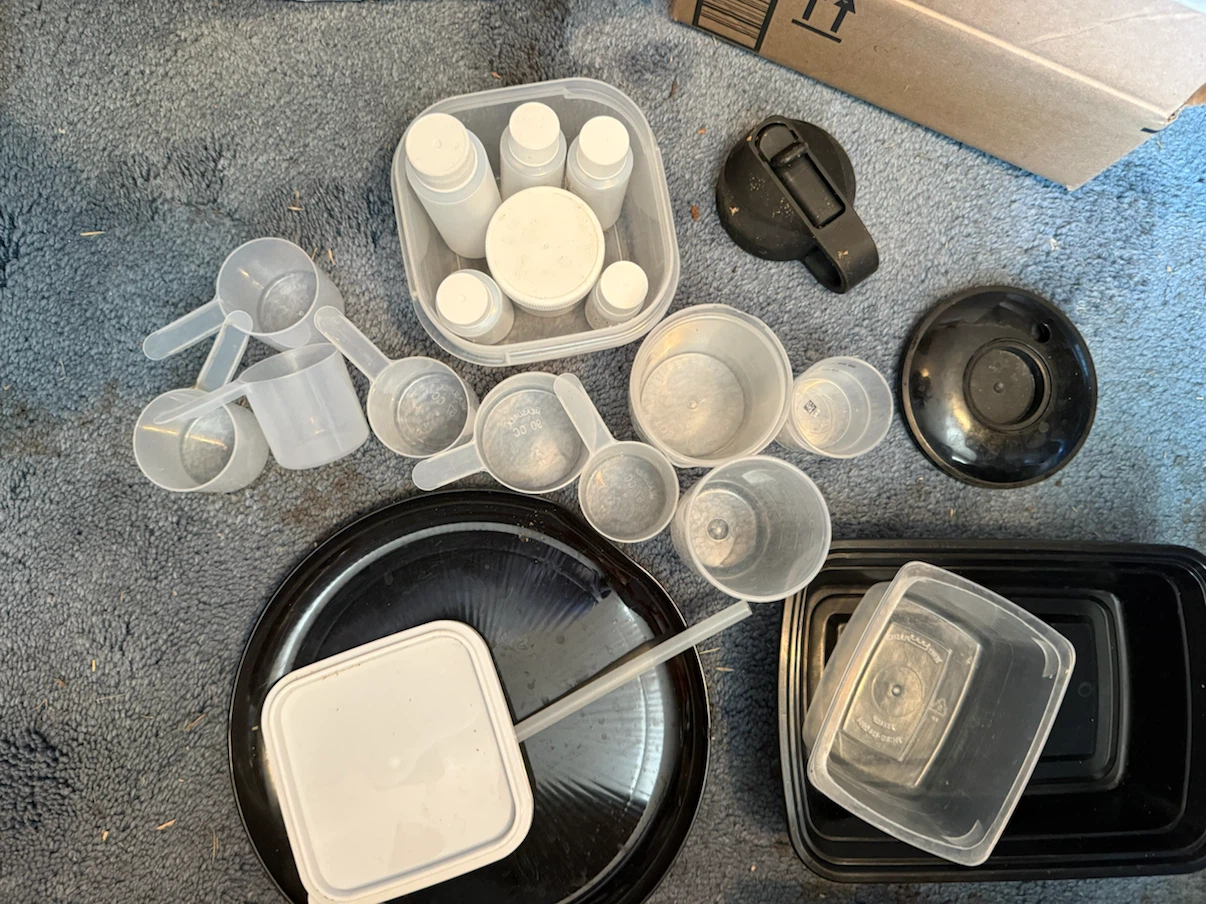 Assorted Plastic Scoops and Containers