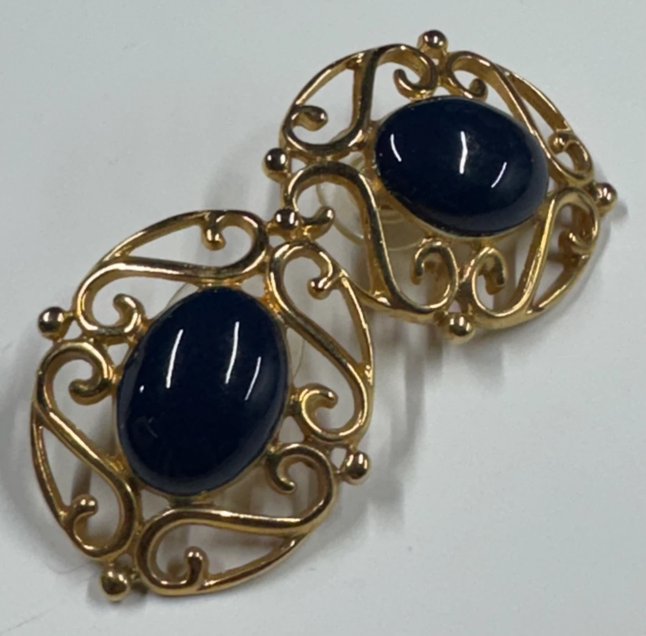 Gold Tone Blue Stone Dangle Earrings