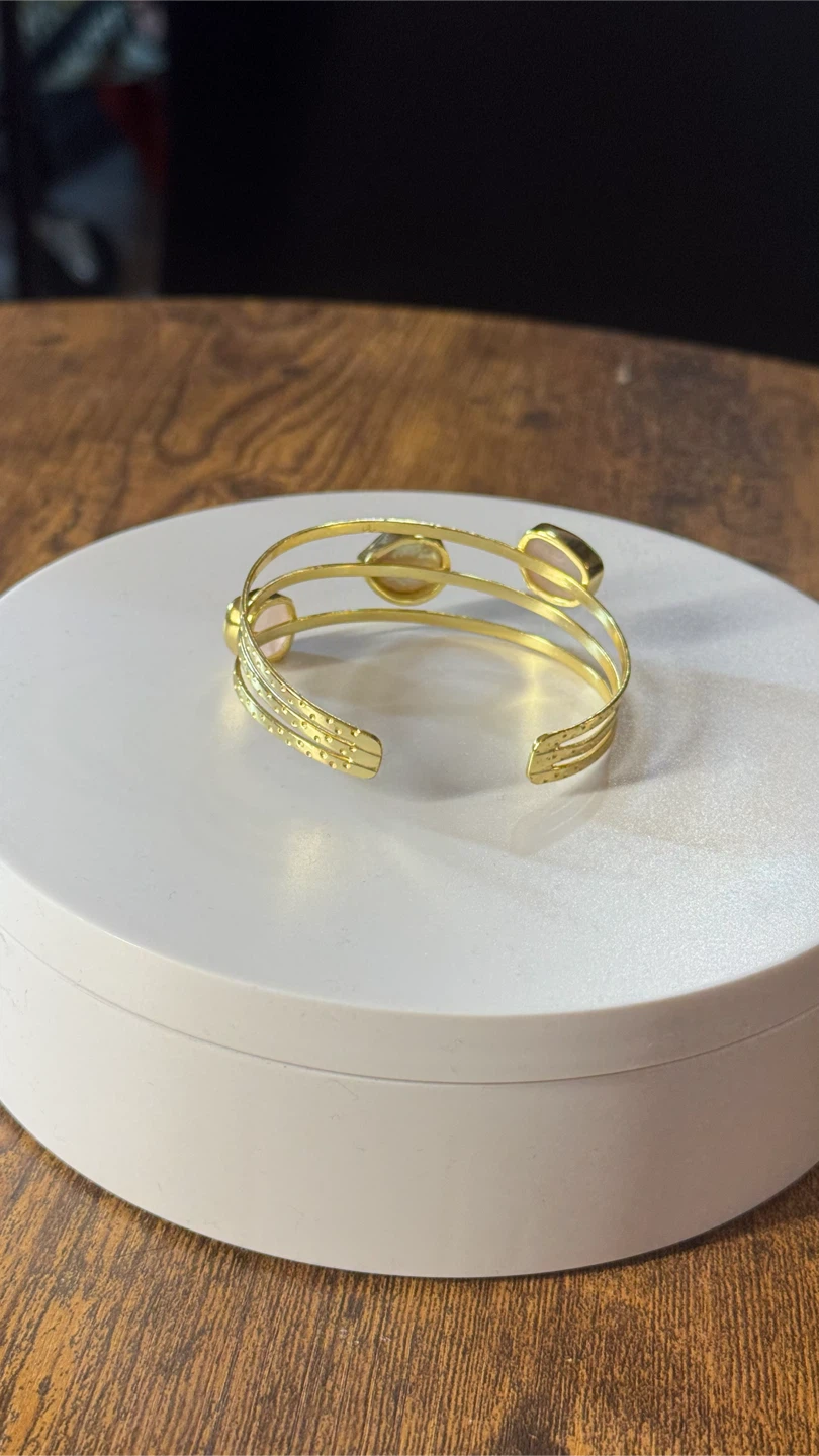 Gold-tone cuff bracelet with stones - photo 3