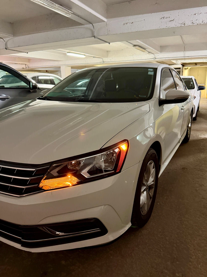 White Volkswagen Passat TSI 2018