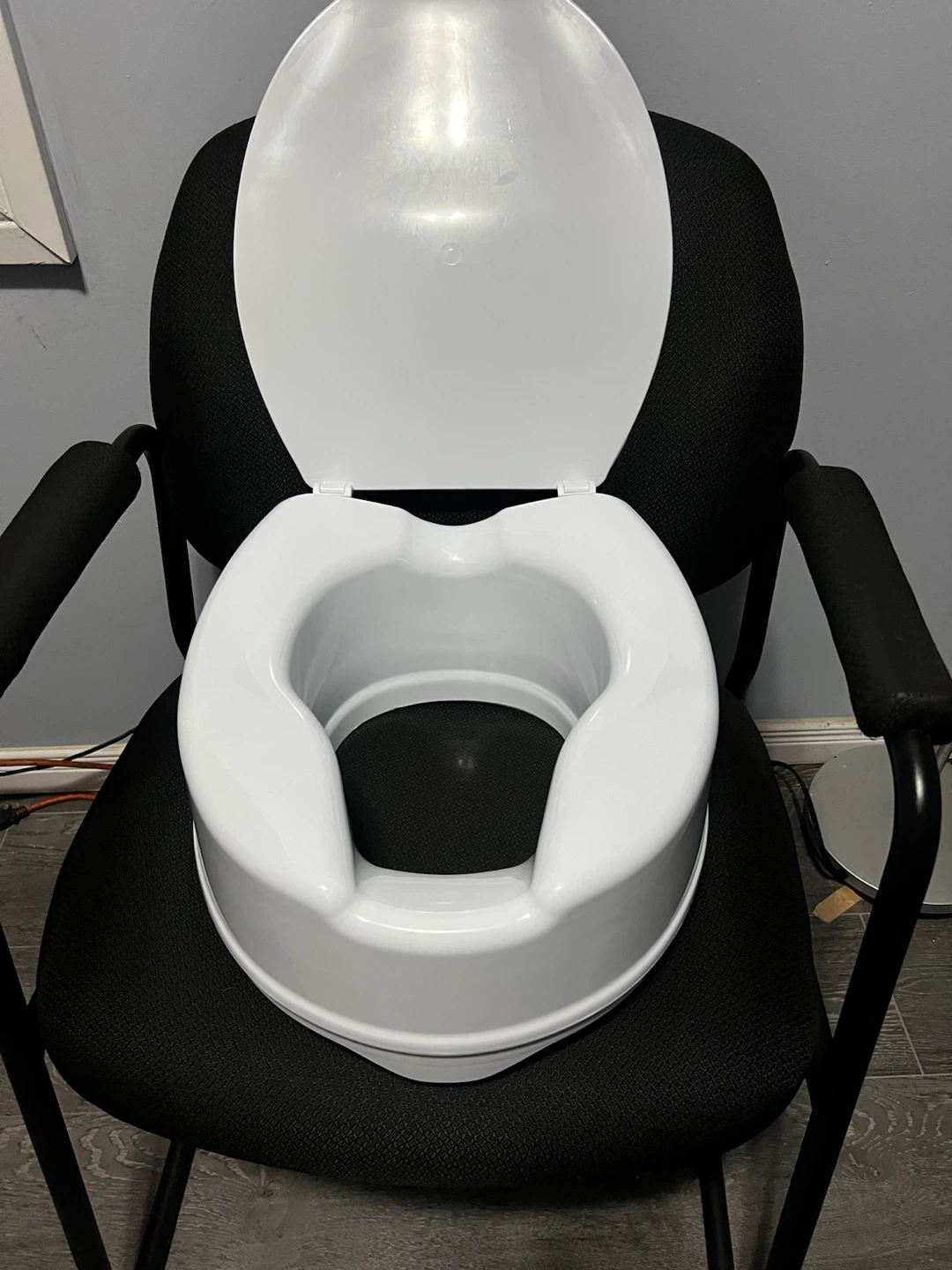 Raised toilet seat