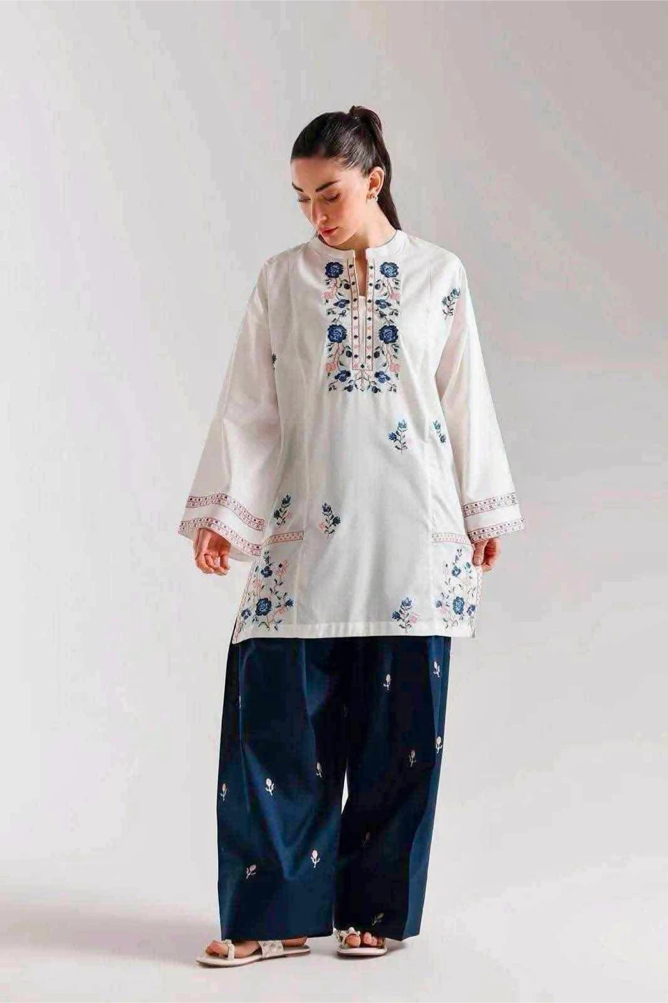 White Embroidered Kurti with Blue Floral Detail