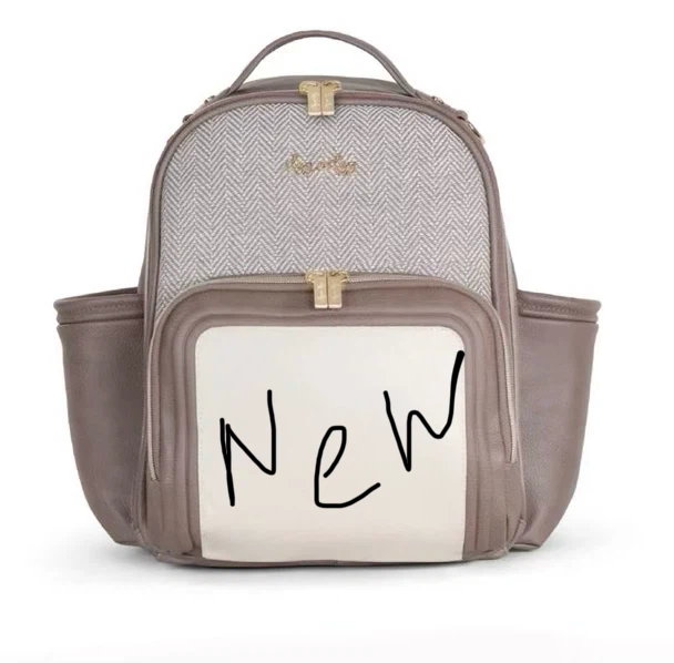 Itsy Ritzy  Diaper Bag Backpack in coffee and cream