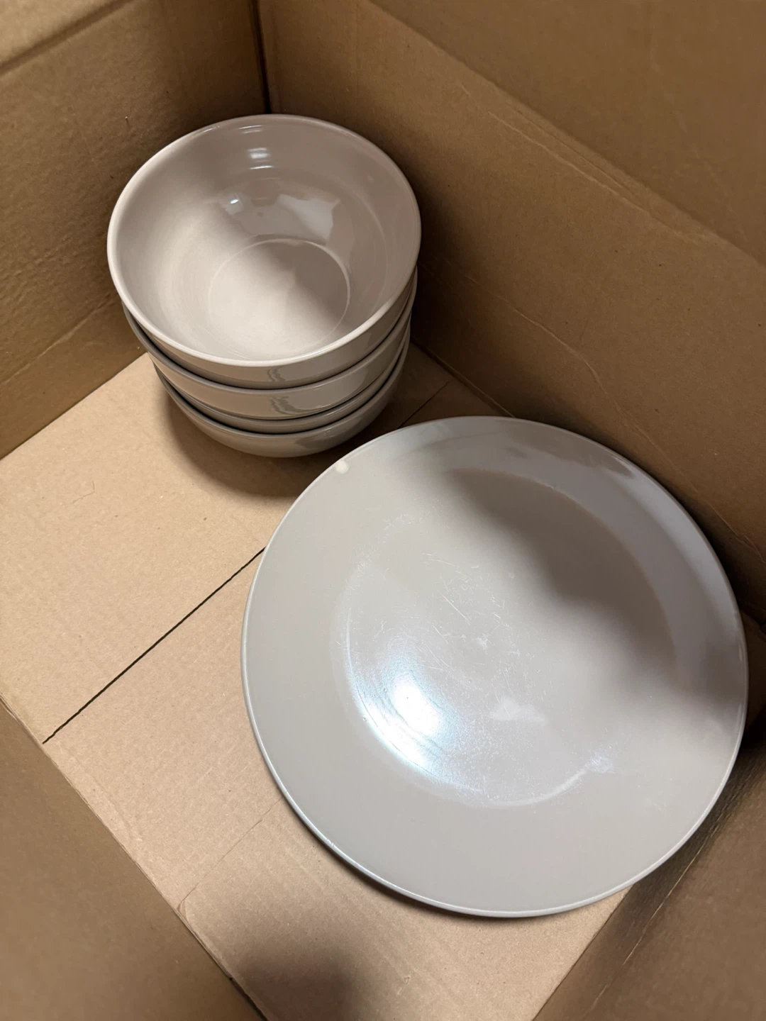 Brown ceramic bowls and plates