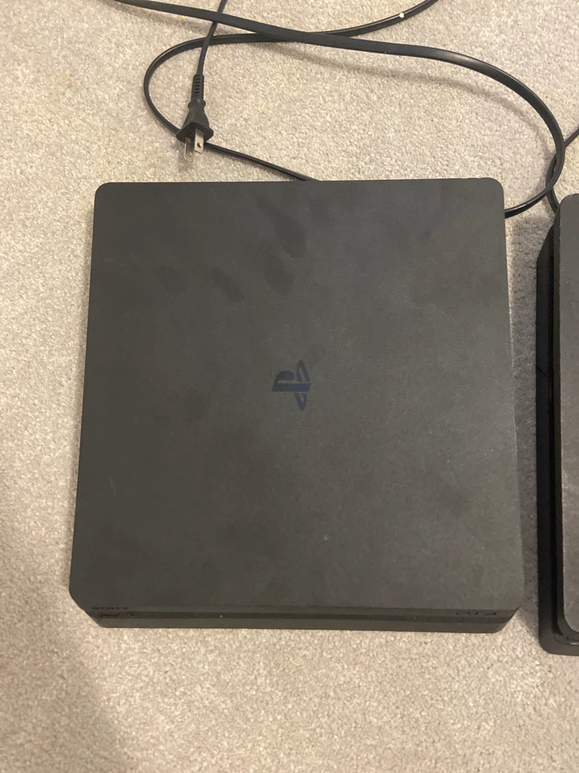 2 PS4 slims plus controllers - photo 3