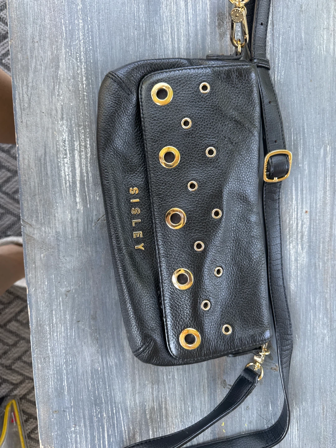 SISLEY Black Leather Crossbody Bag with Gold Eyelets