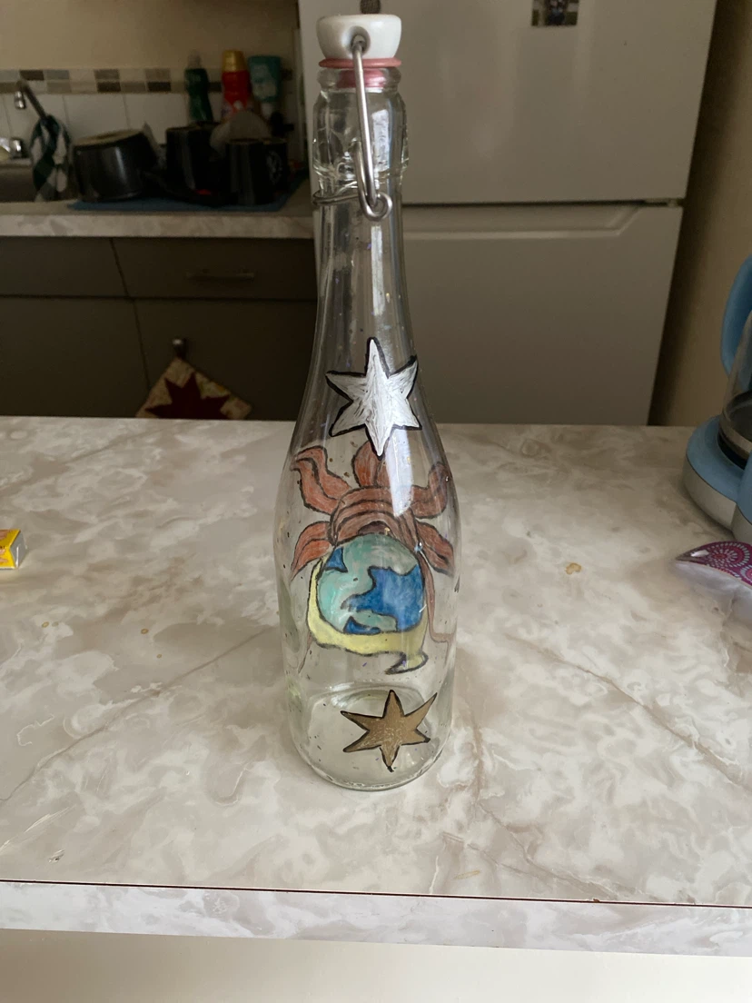 Clear glass swing-top bottle with Earth and sun design - photo 2