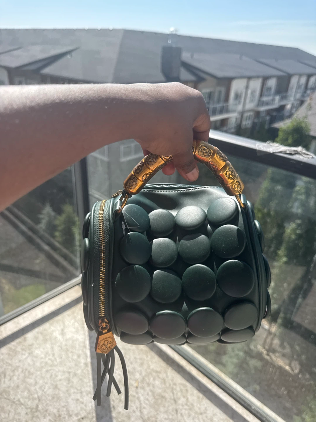 Green Handbag with Gold Accents
