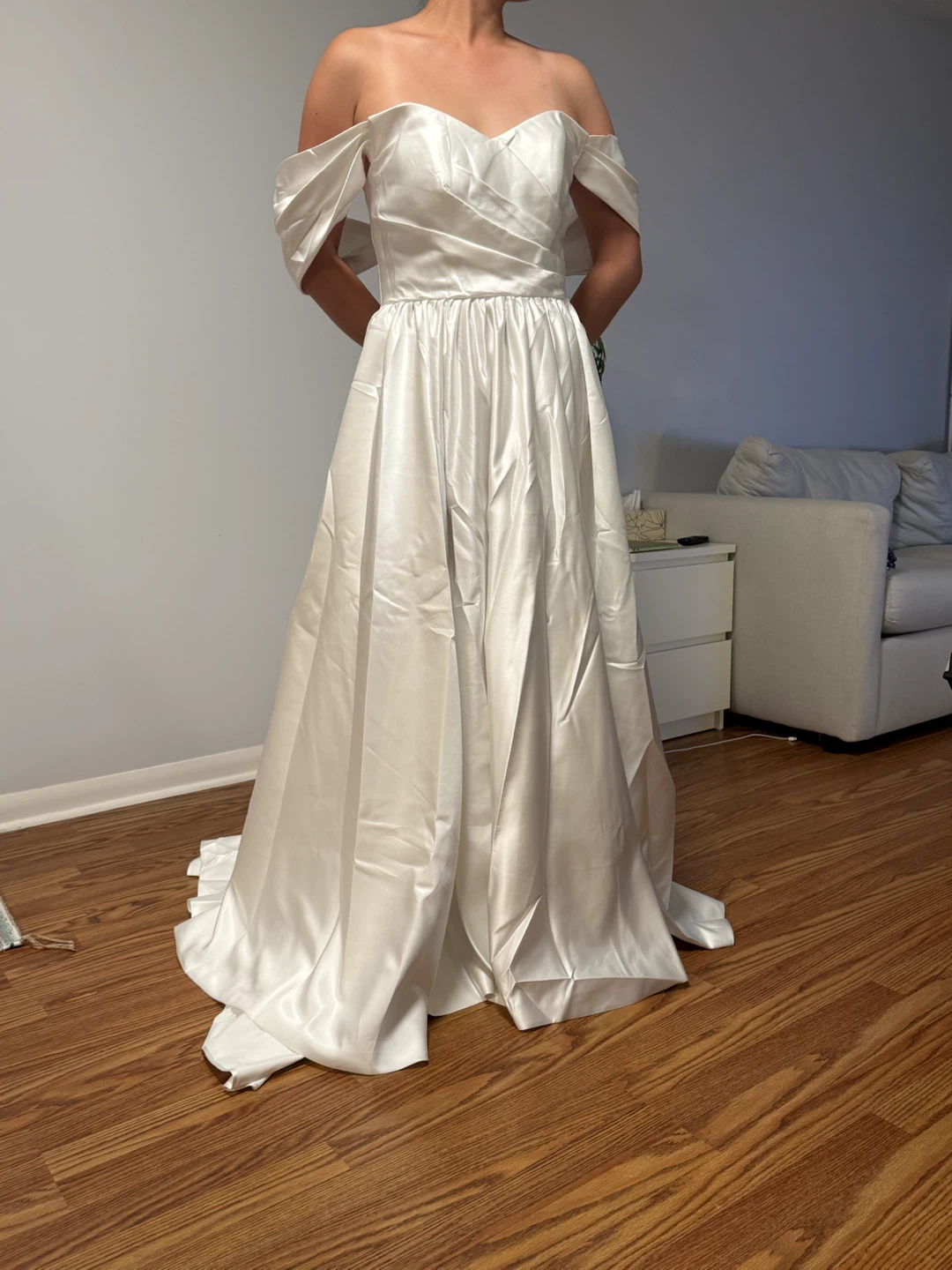 Off-the-shoulder satin wedding dress
