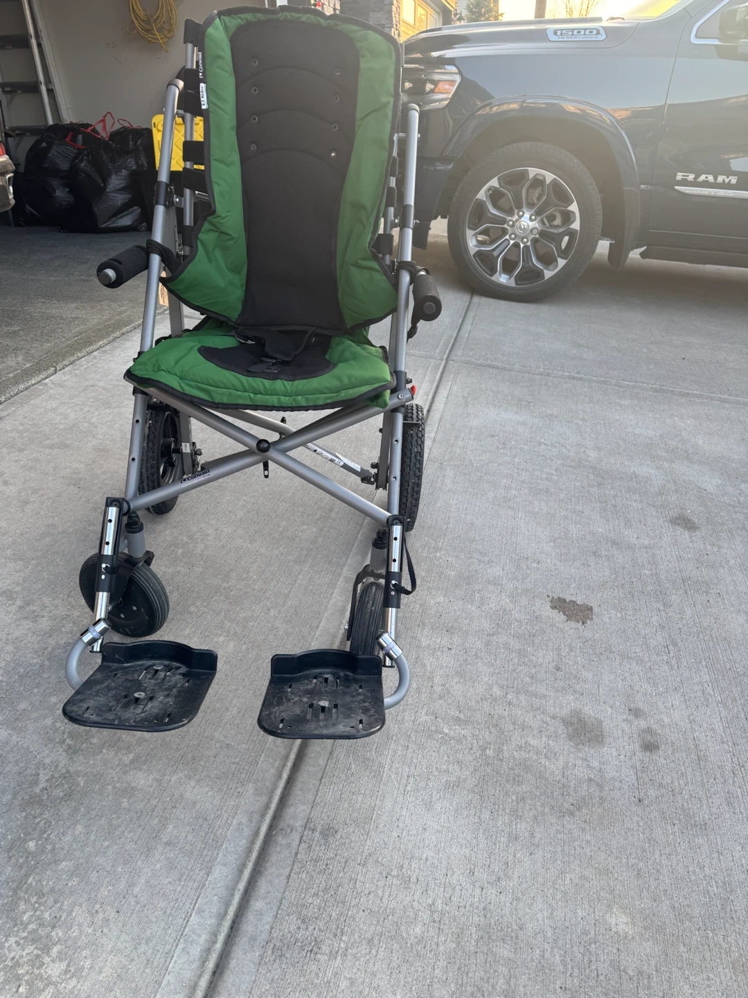 Green Lightweight Convaid EZ Rider stroller