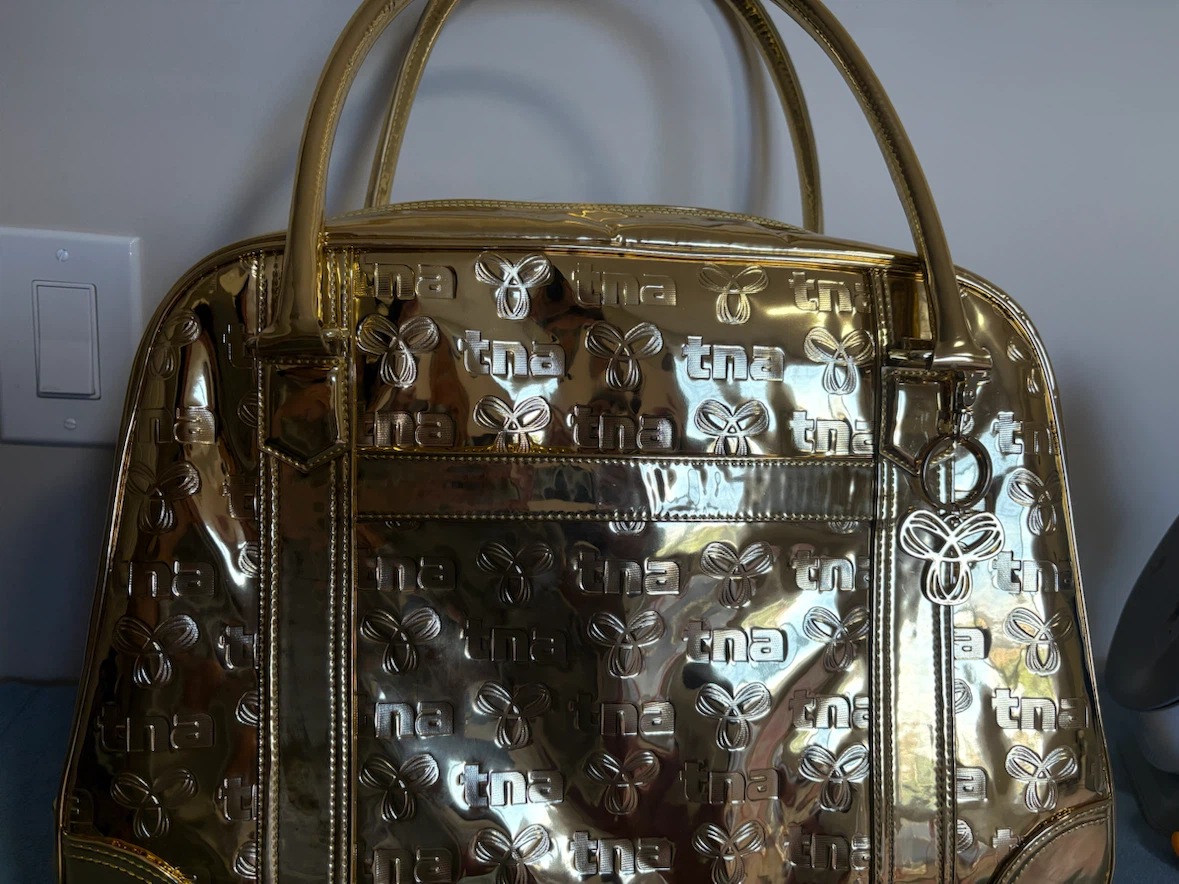 TNA Gold bowler tote Bag