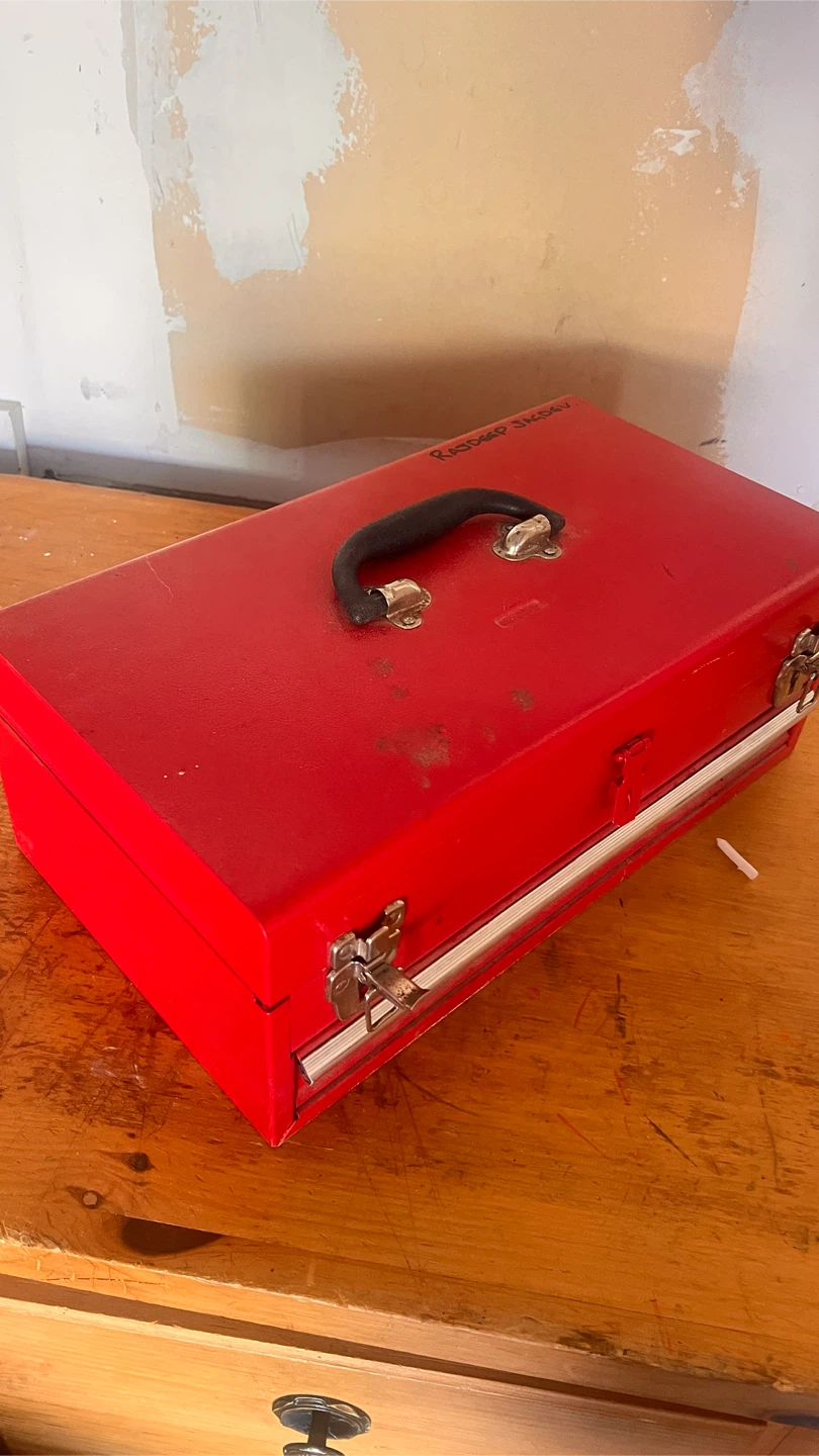 Red Metal Toolbox with Socket Set
