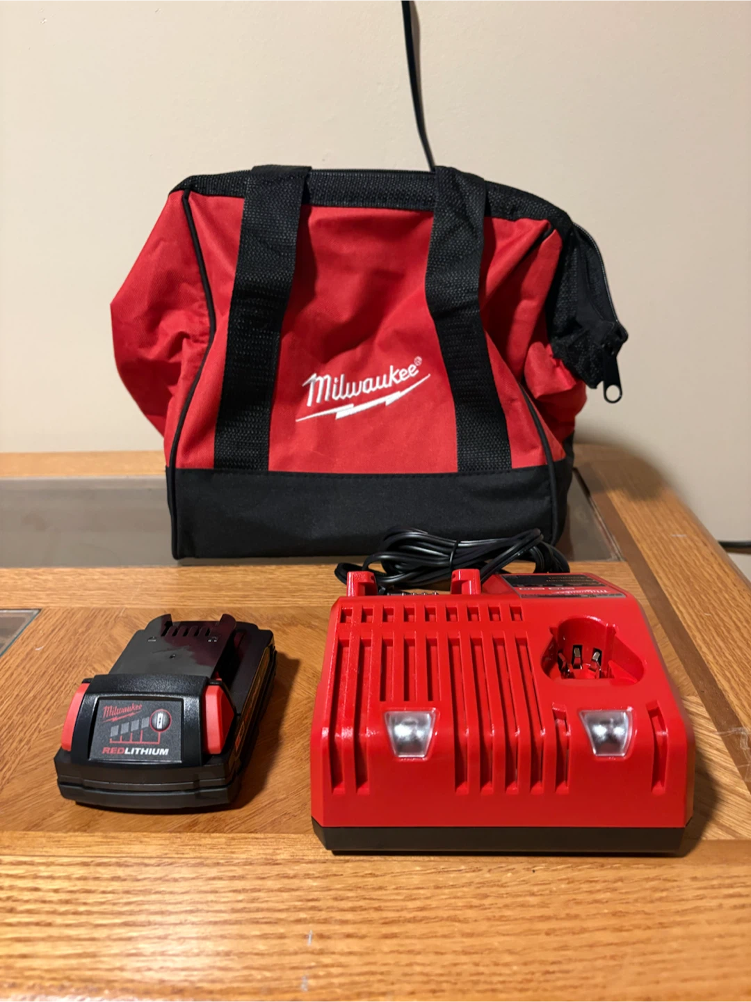 Milwaukee REDLITHIUM Battery, Charger, and Bag
