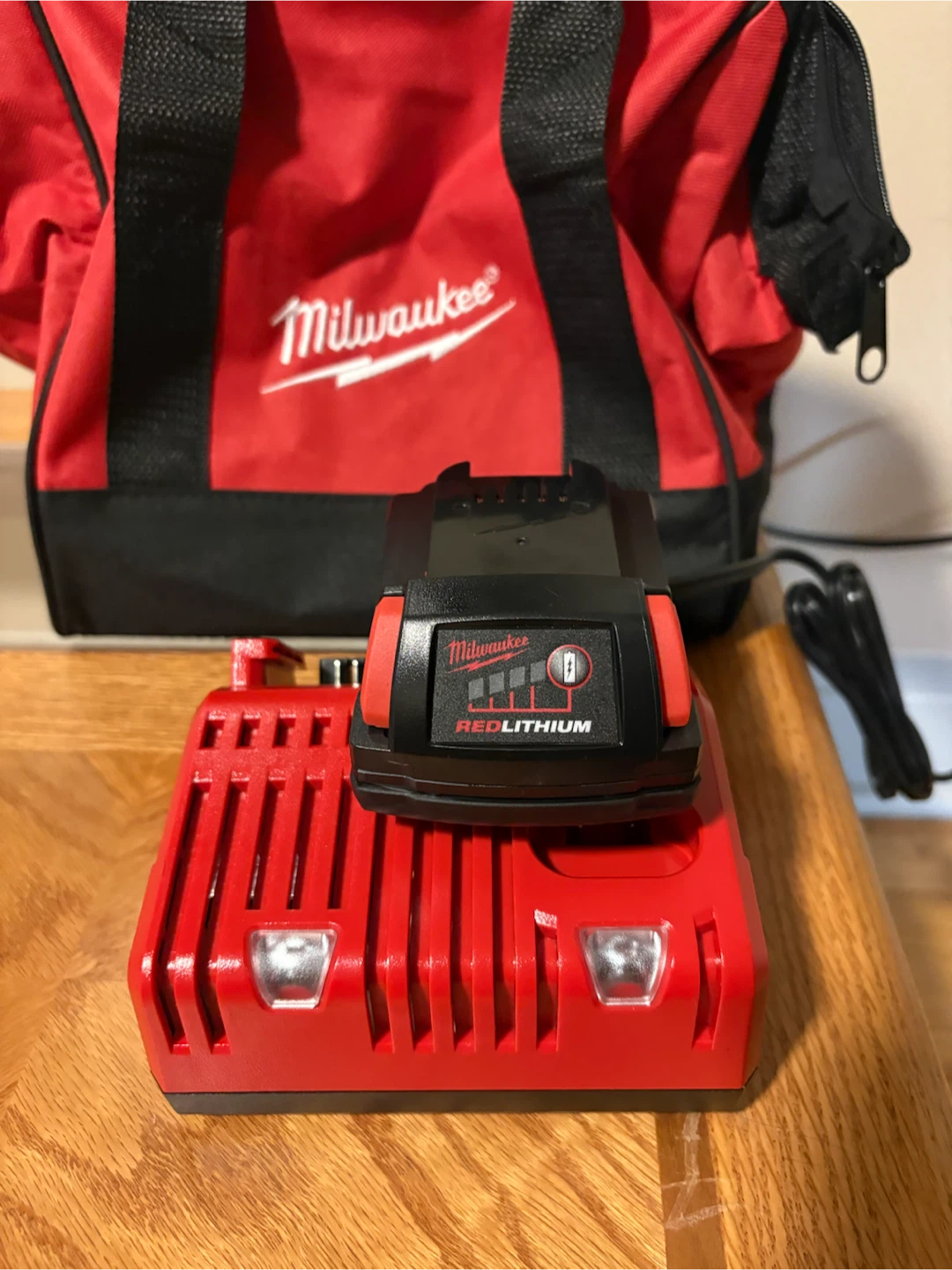 Milwaukee REDLITHIUM Battery, Charger, and Bag - photo 4