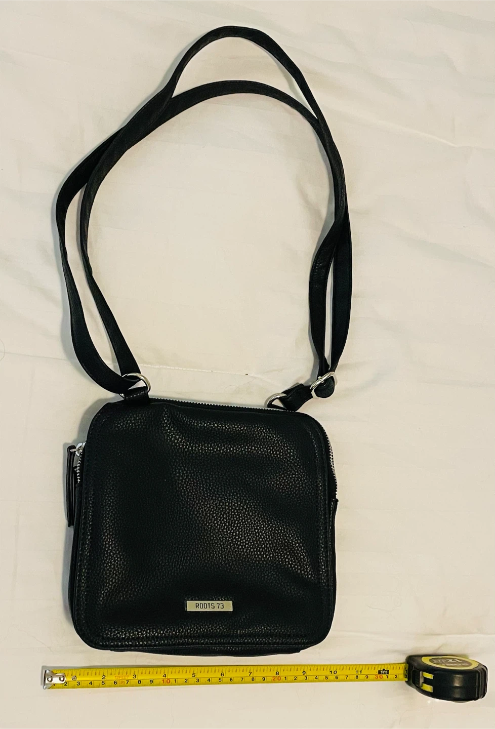 Roots black leather purse
