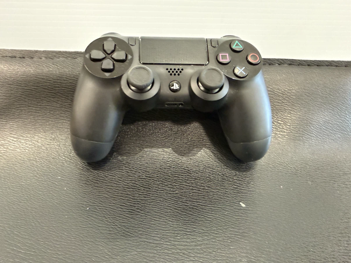 Black Sony PlayStation 4 DualShock 4 Controller