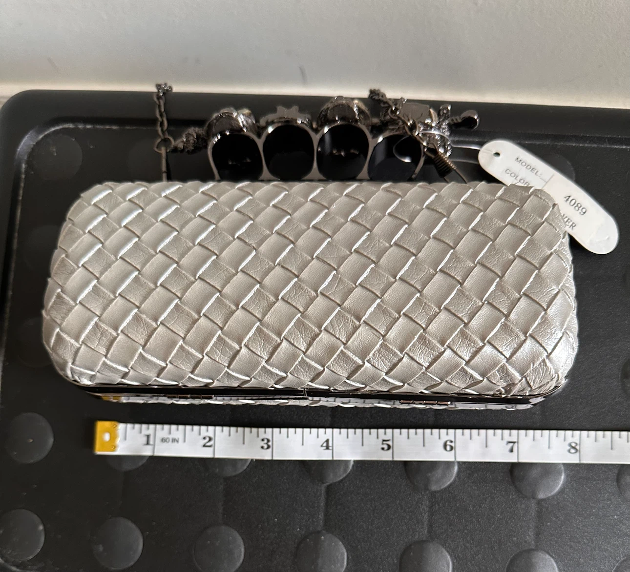 Silver Woven Clutch with Skull Ring Handle