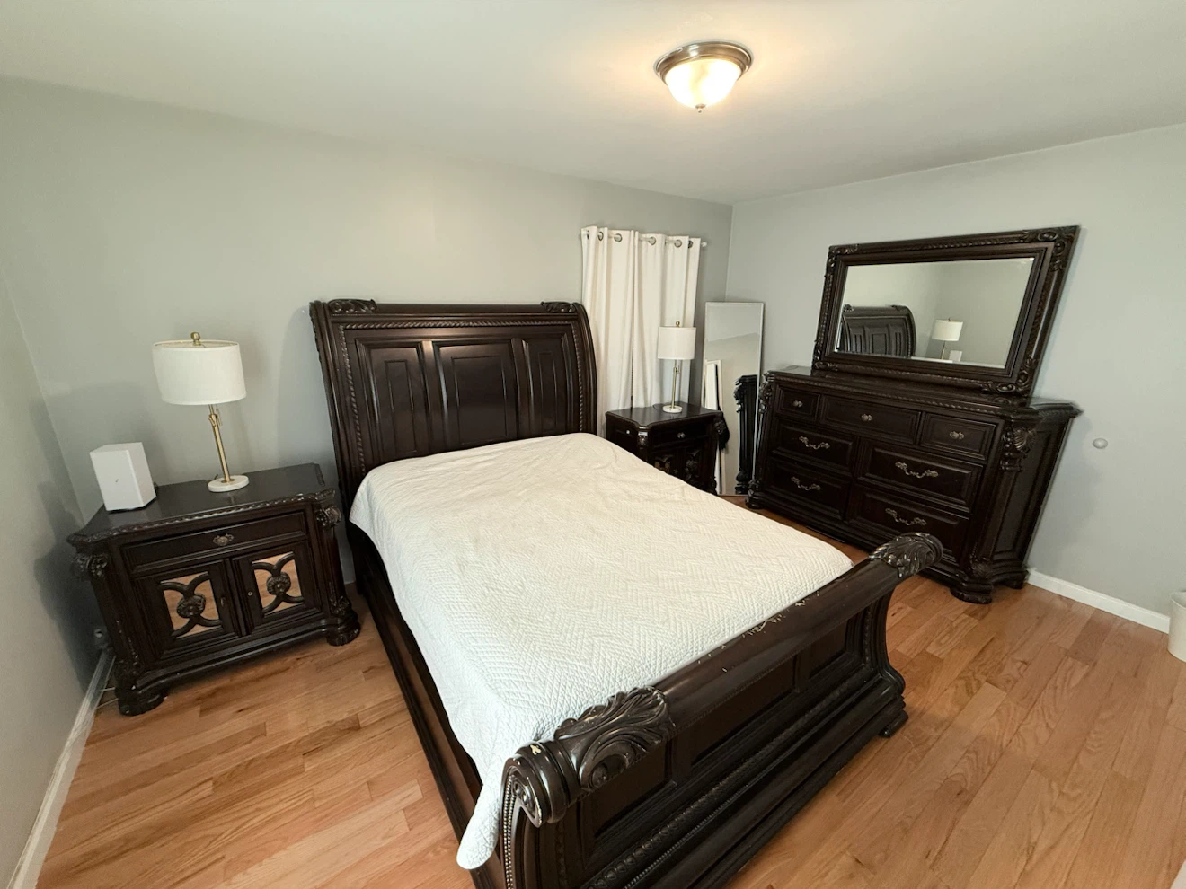 Dark Wood Sleigh Bed Frame with Ornate Detailing