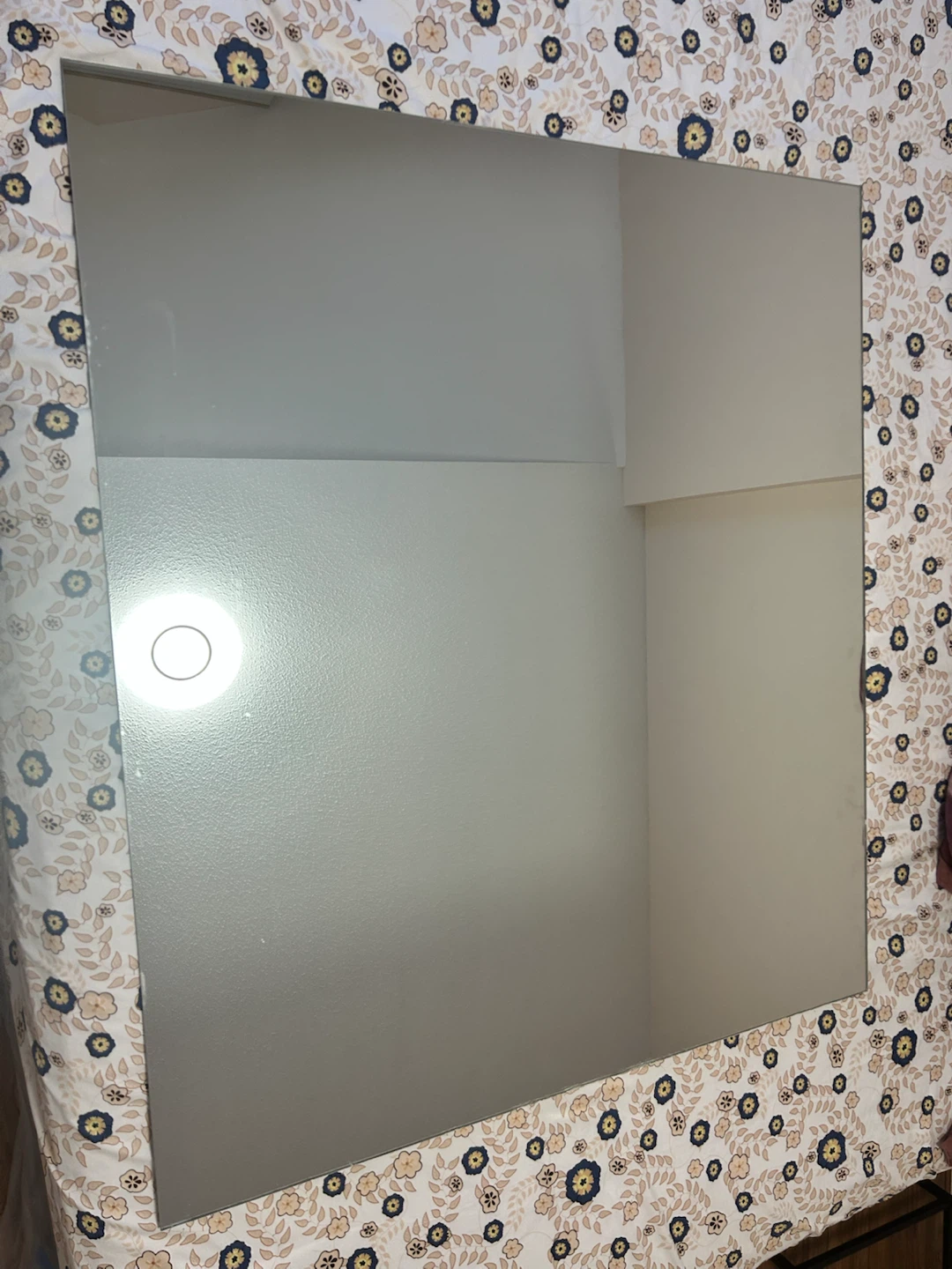 Unframed mirror