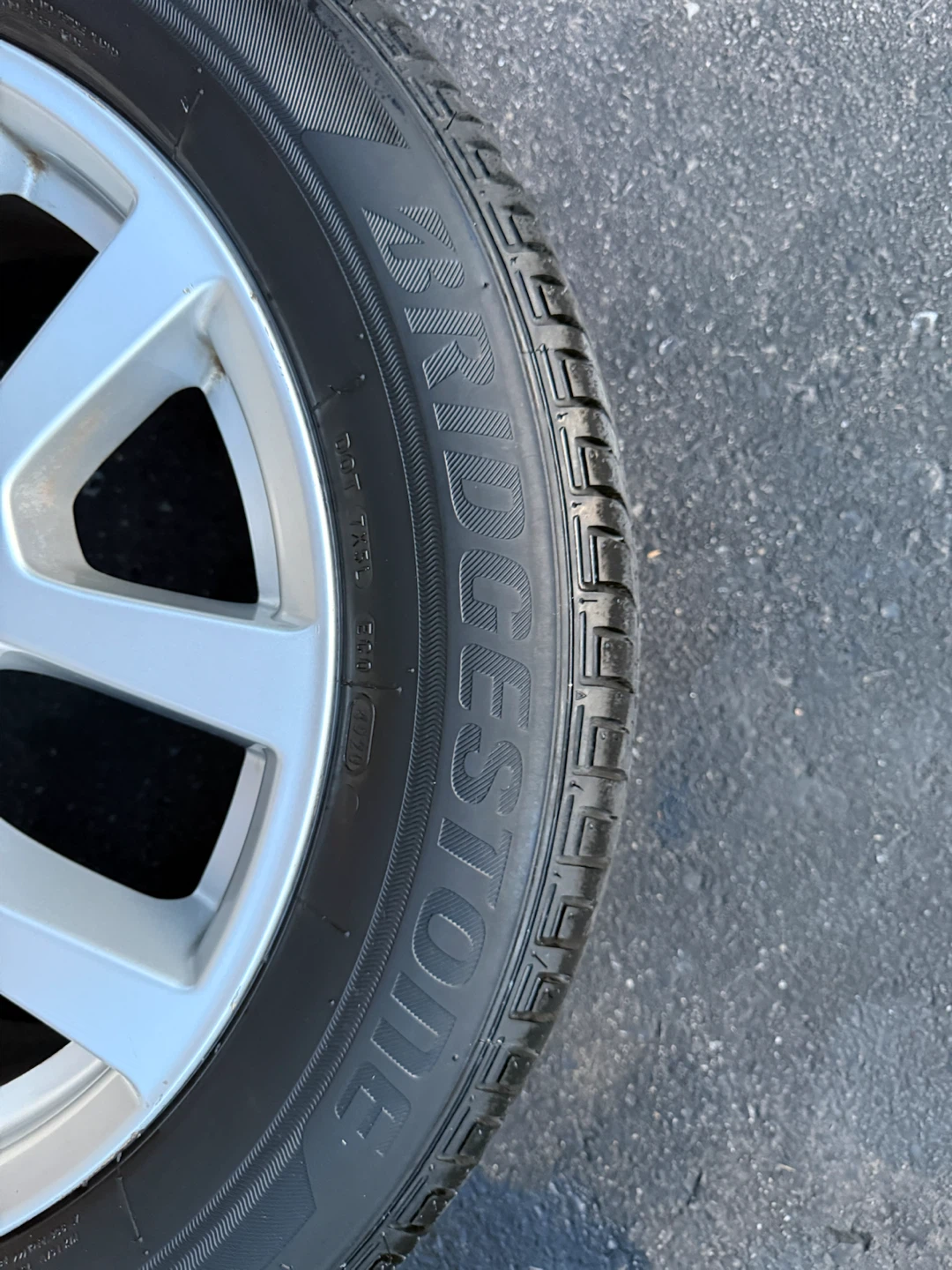 Bridgestone Tire with Nissan Rim - photo 3