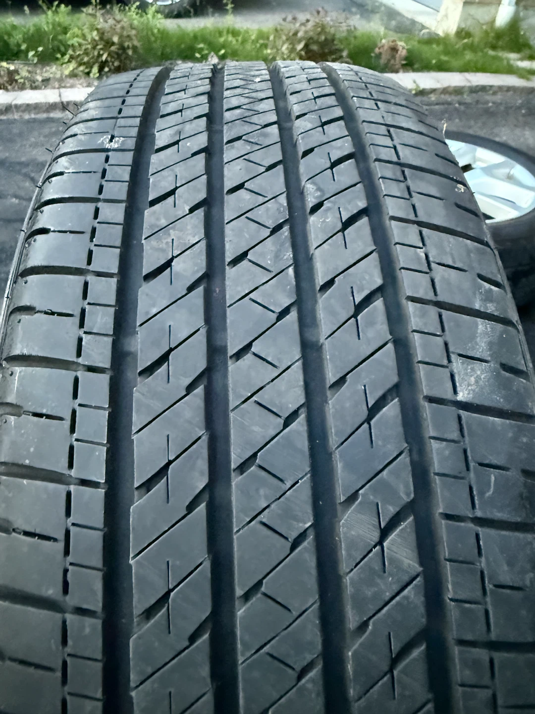 Bridgestone Tire with Nissan Rim - photo 4